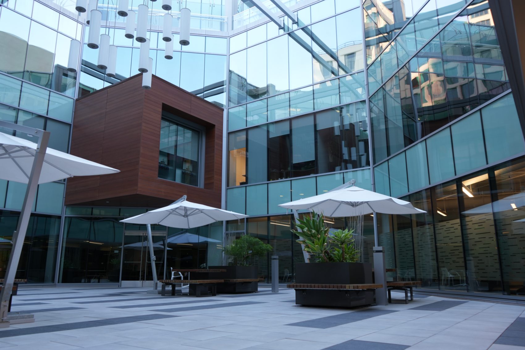 The glass courtyard at the RedCoin Capital office in San Diego
